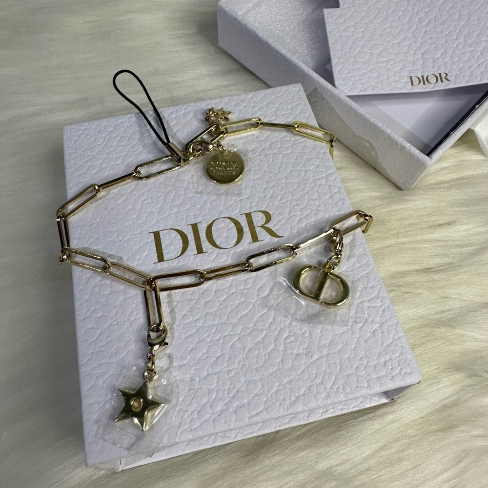 DIOR cellphone keychain in gold